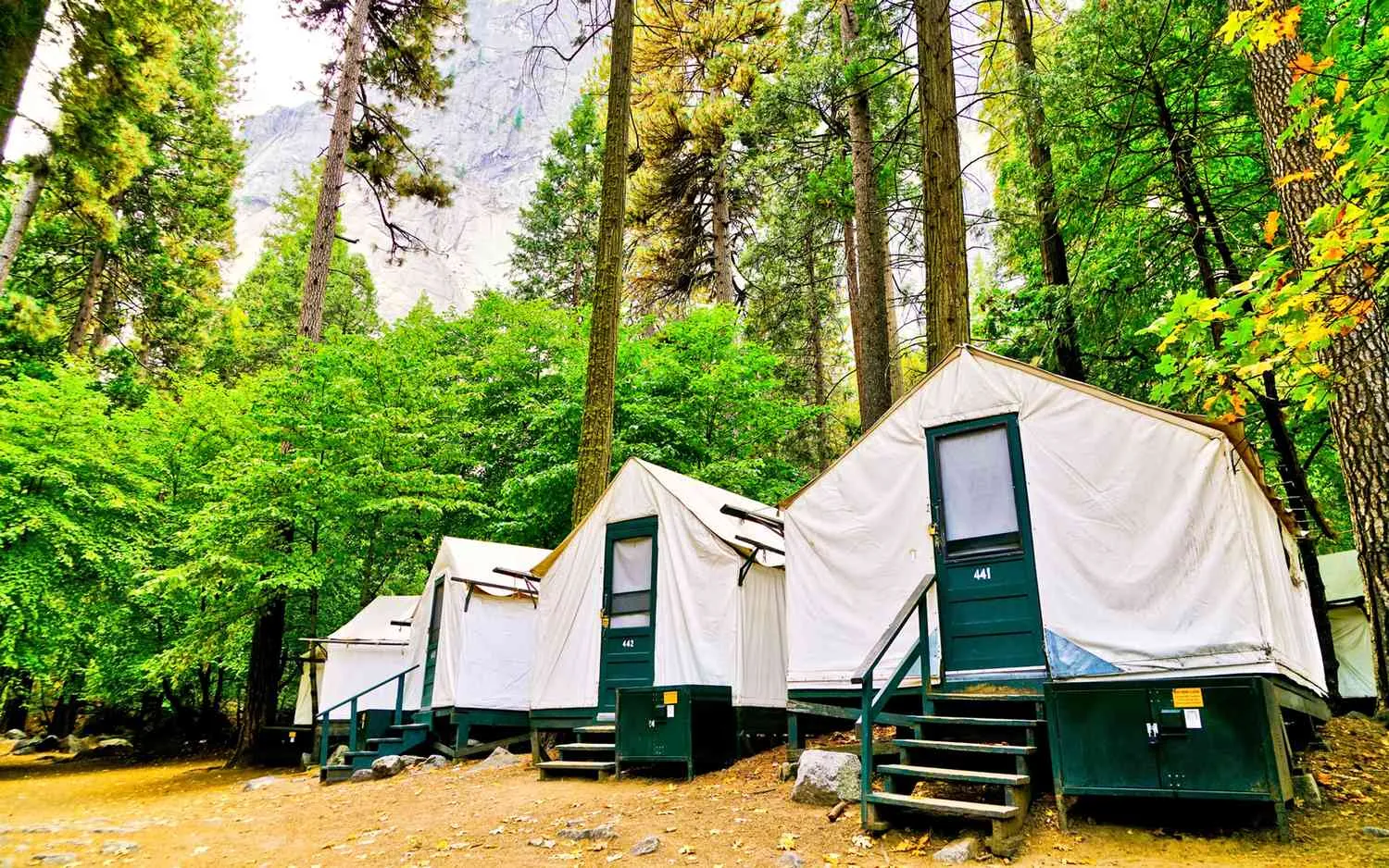 High country camping in Yosemite with mountain meadows and granite peaks in the background
