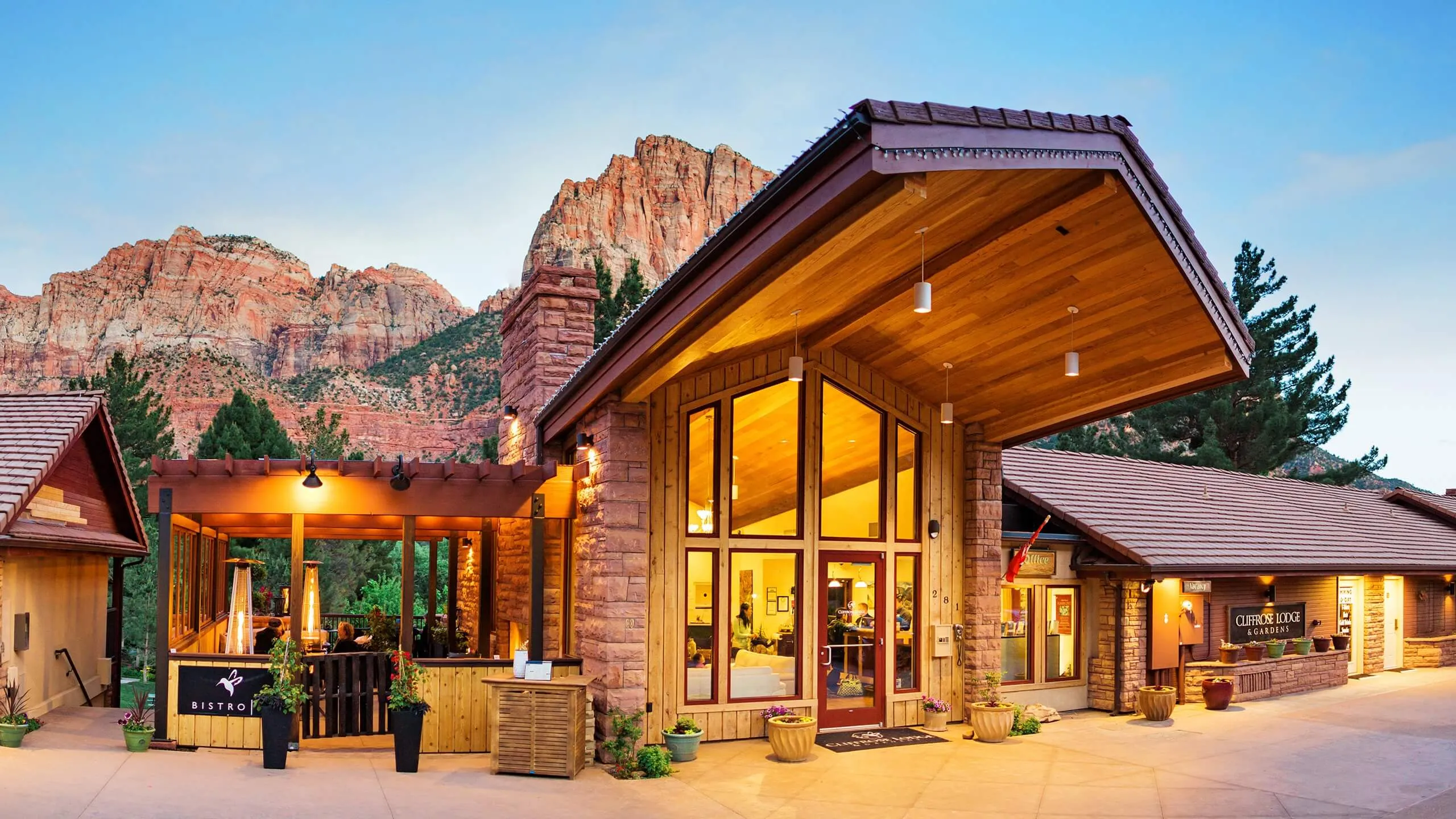 Luxurious Cliffrose Lodge exterior with mountain views and desert landscaping near Zion National Park