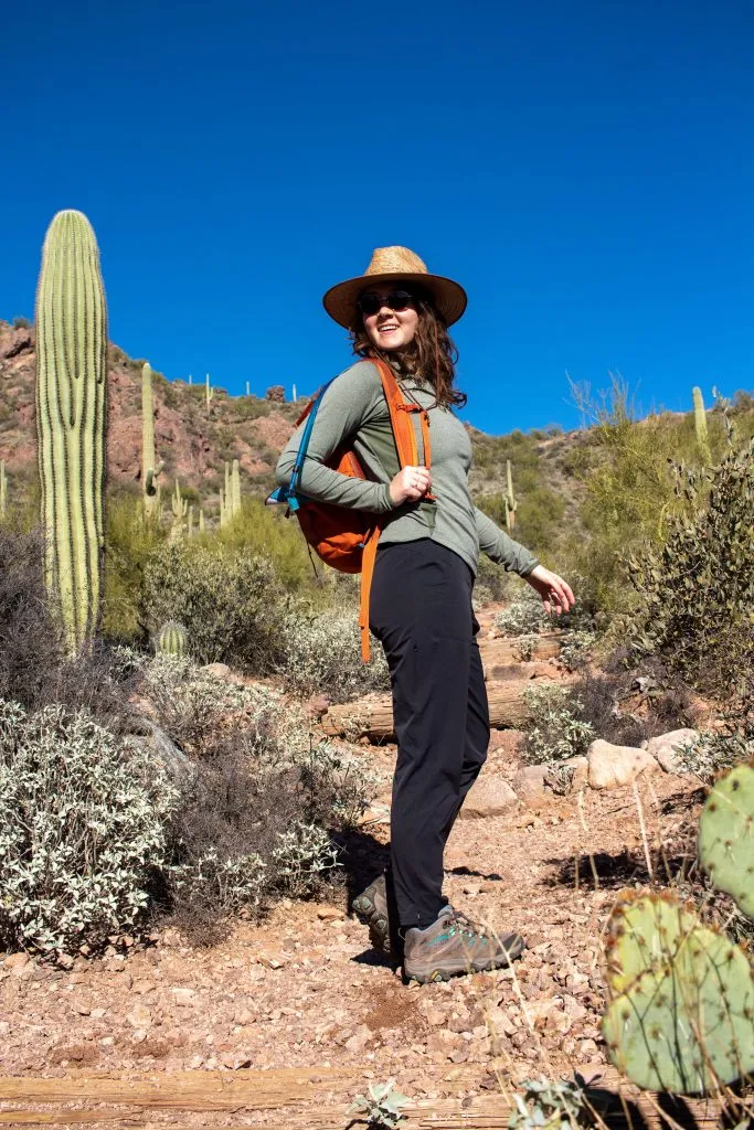 Seasonal hiking outfit combinations showing different weather-appropriate clothing layers