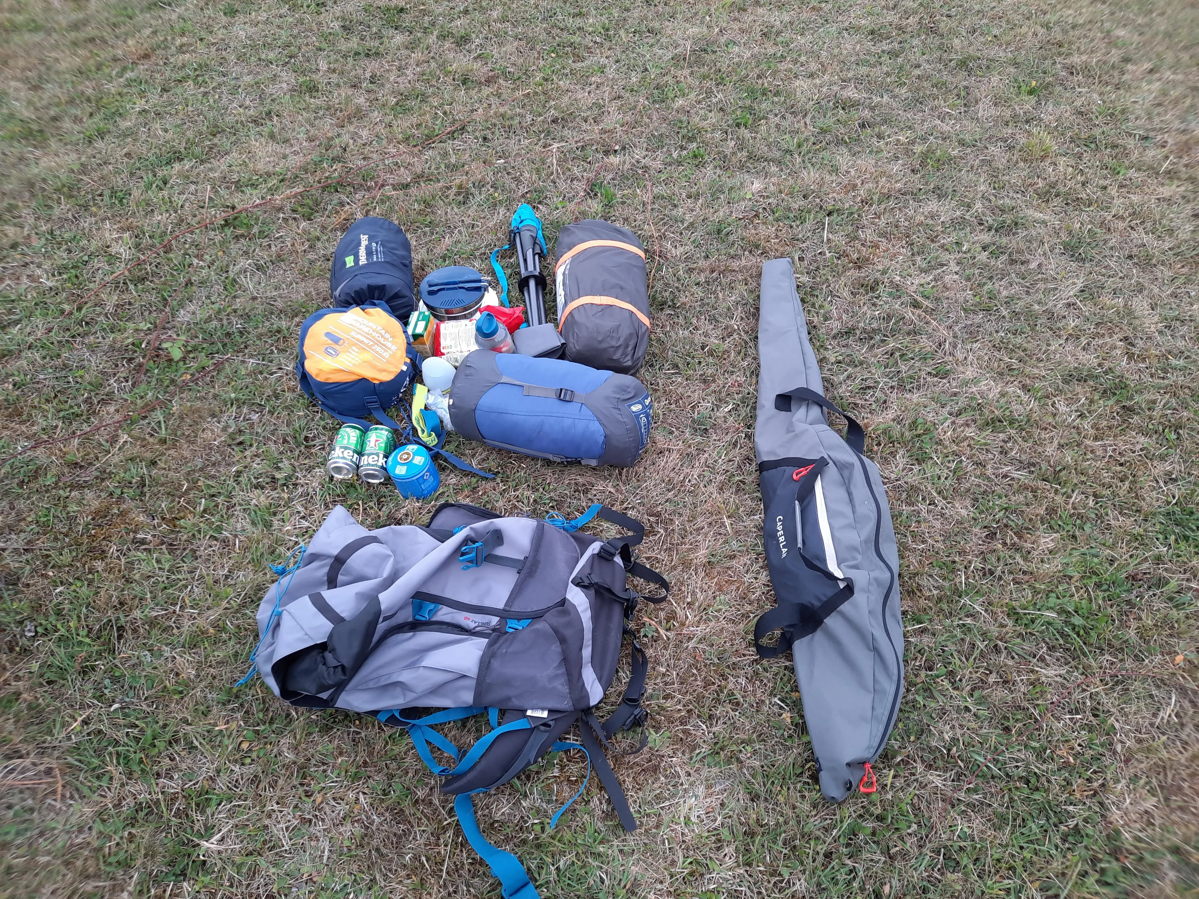 Lightweight backpacking tent and sleeping bag setup in outdoor setting