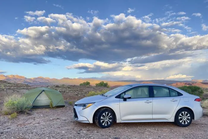 Camping gear laid out for national parks adventure