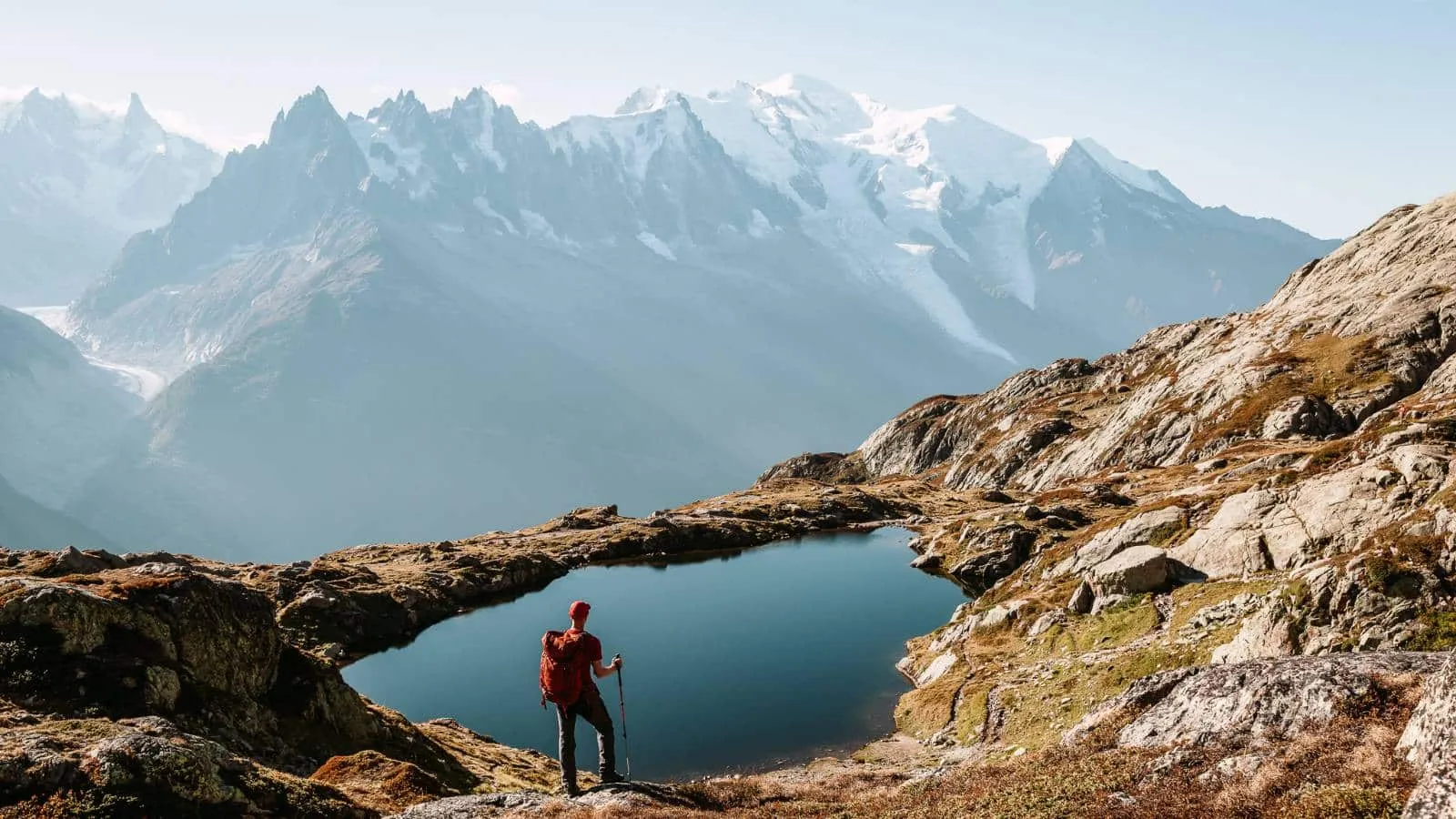 Spectacular Tour du Mont Blanc trail with snow-capped peaks and alpine meadows