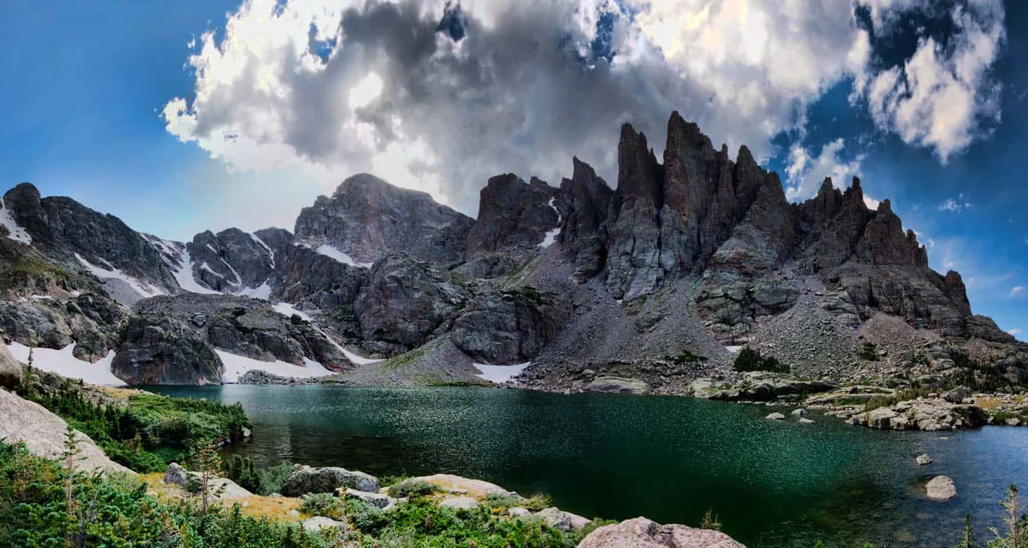 Sky Pond surrounded by dramatic mountain peaks in Rocky Mountain National Park