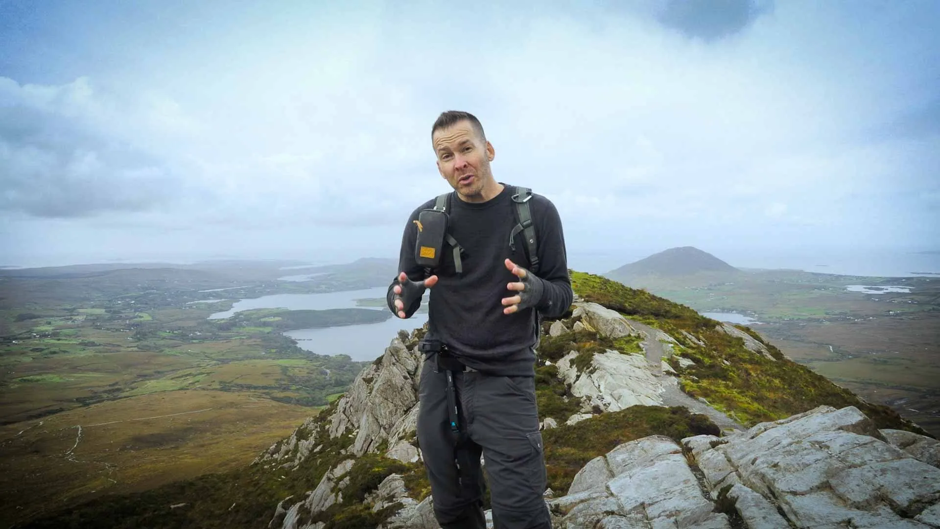 Hiker using emergency whistle for signaling help