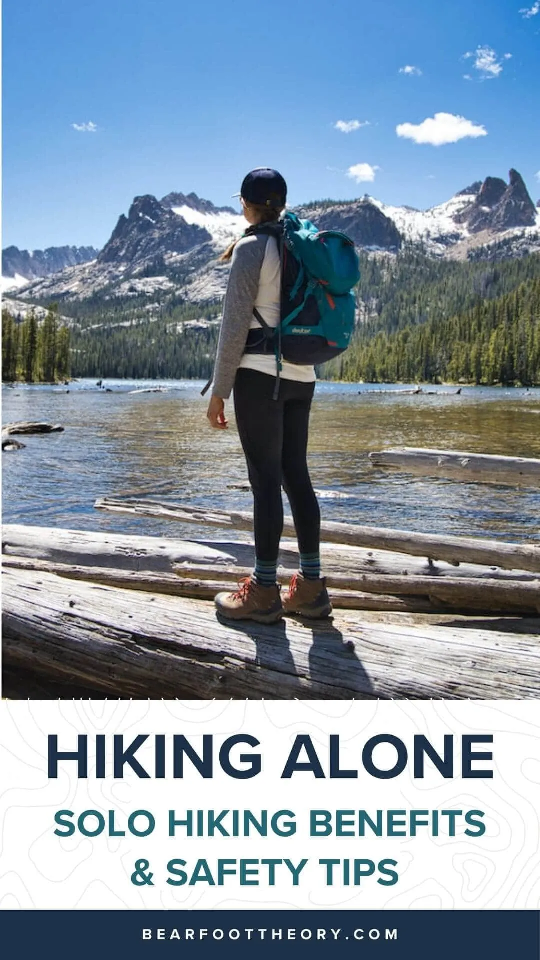 Solo hiker on mountain trail demonstrating hiking alone safety tips
