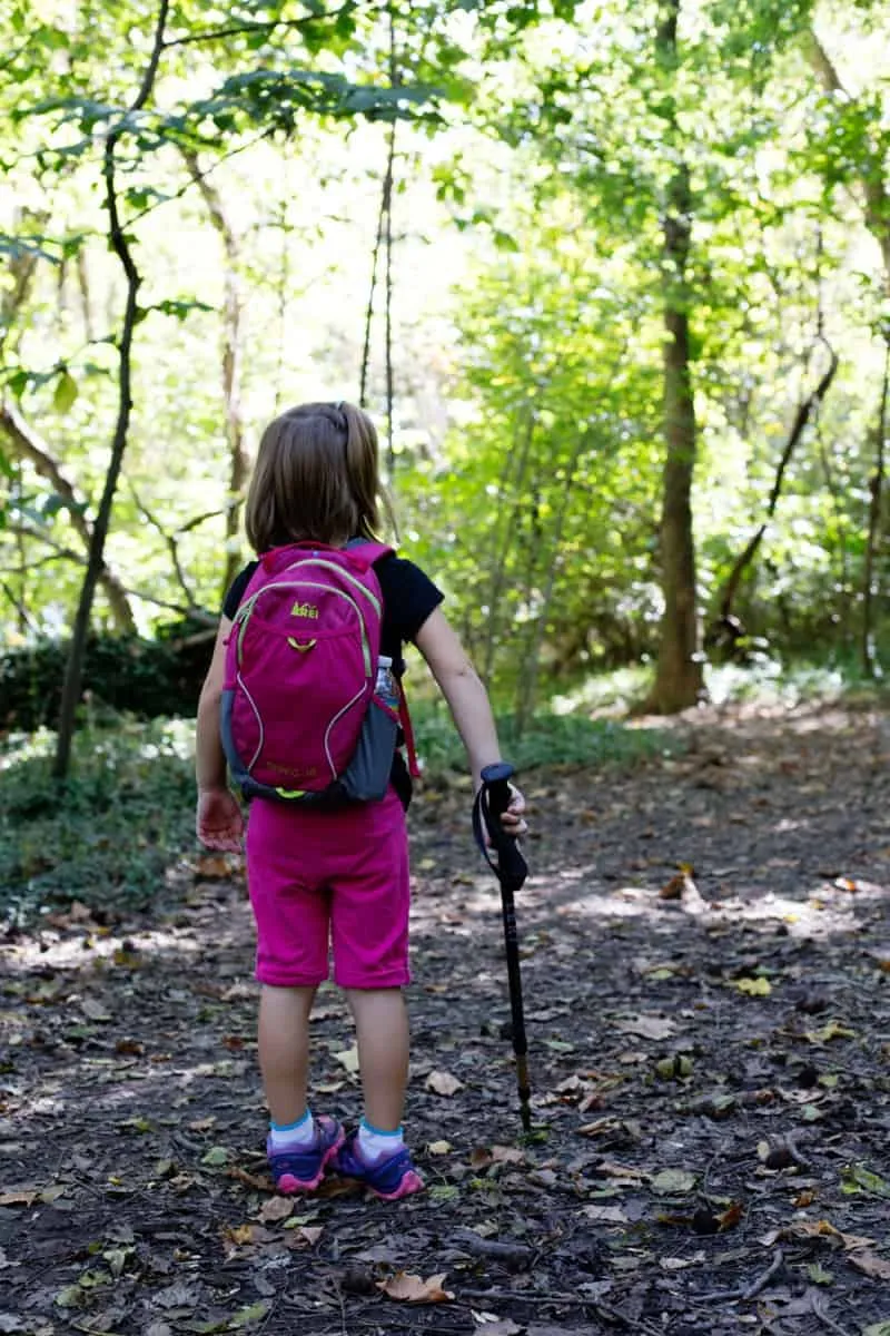 Family planning hiking route with children using map and preparation checklist