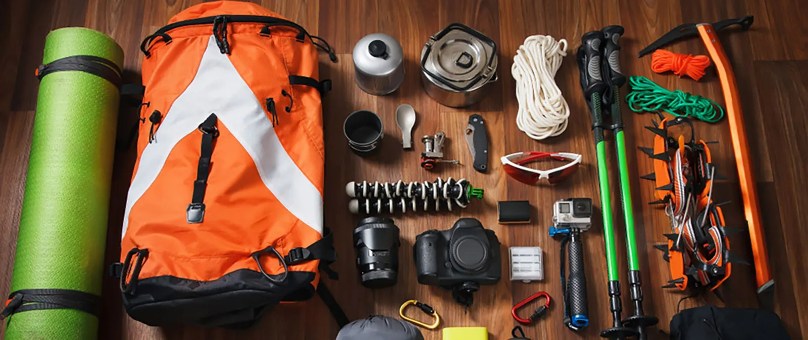 Essential hiking safety equipment including first aid and emergency gear