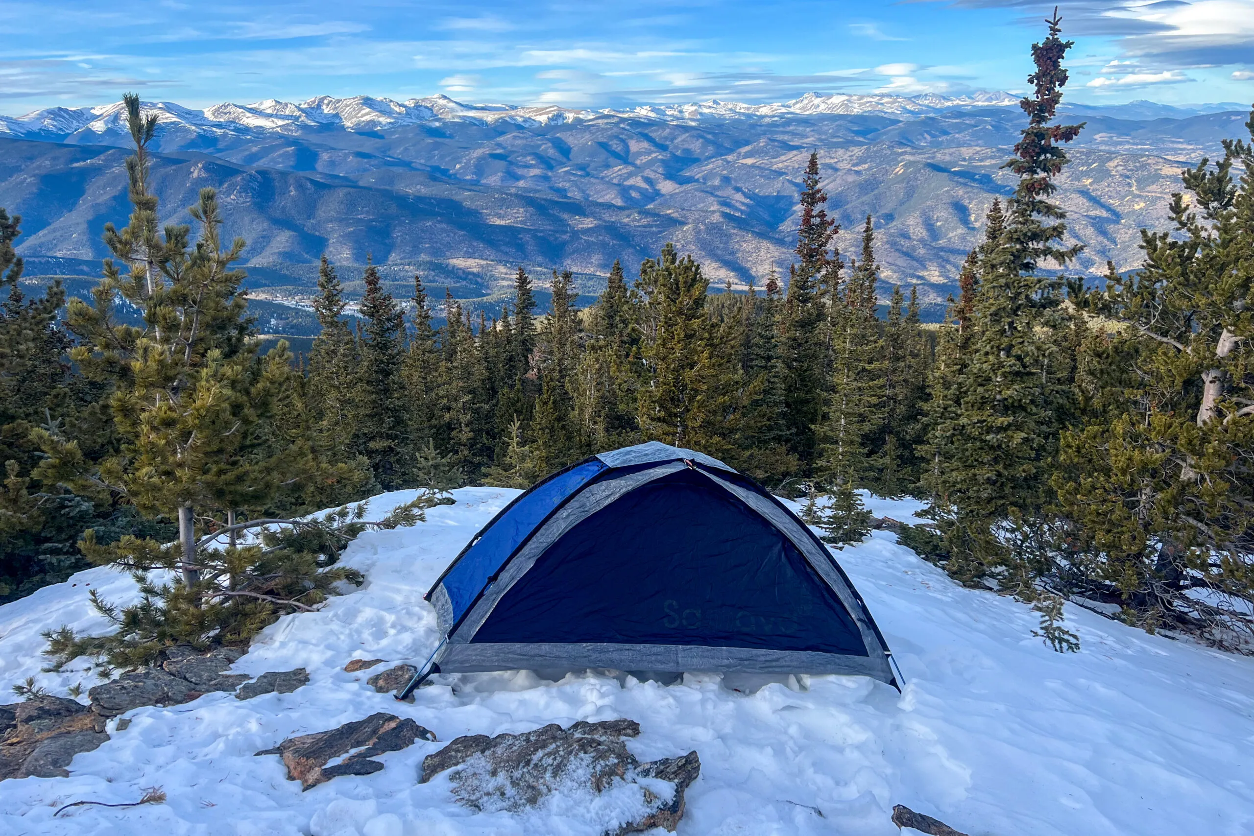 Professional tent setup in alpine conditions