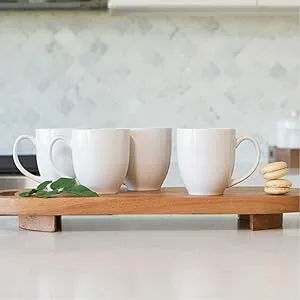 White ceramic mugs with ergonomic handles