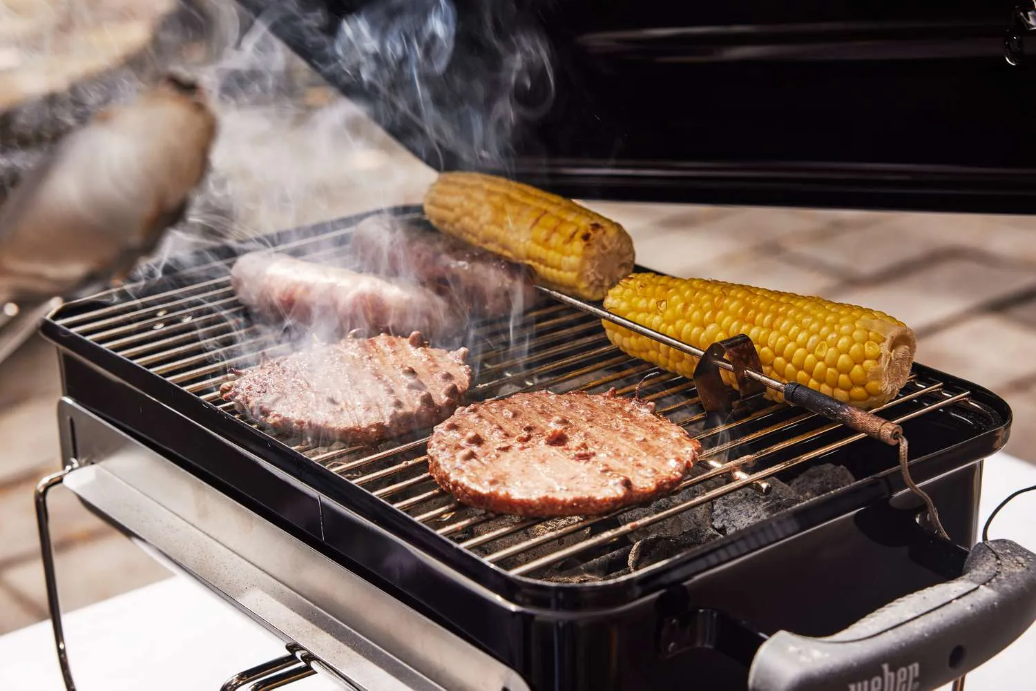 Weber Go-Anywhere charcoal grill in action
