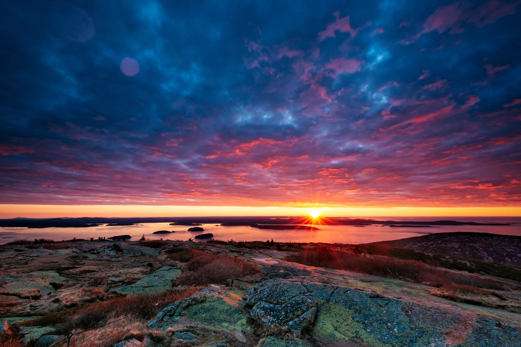 Spectacular sunrise views from mountains in Acadia National Park showing seasonal beauty