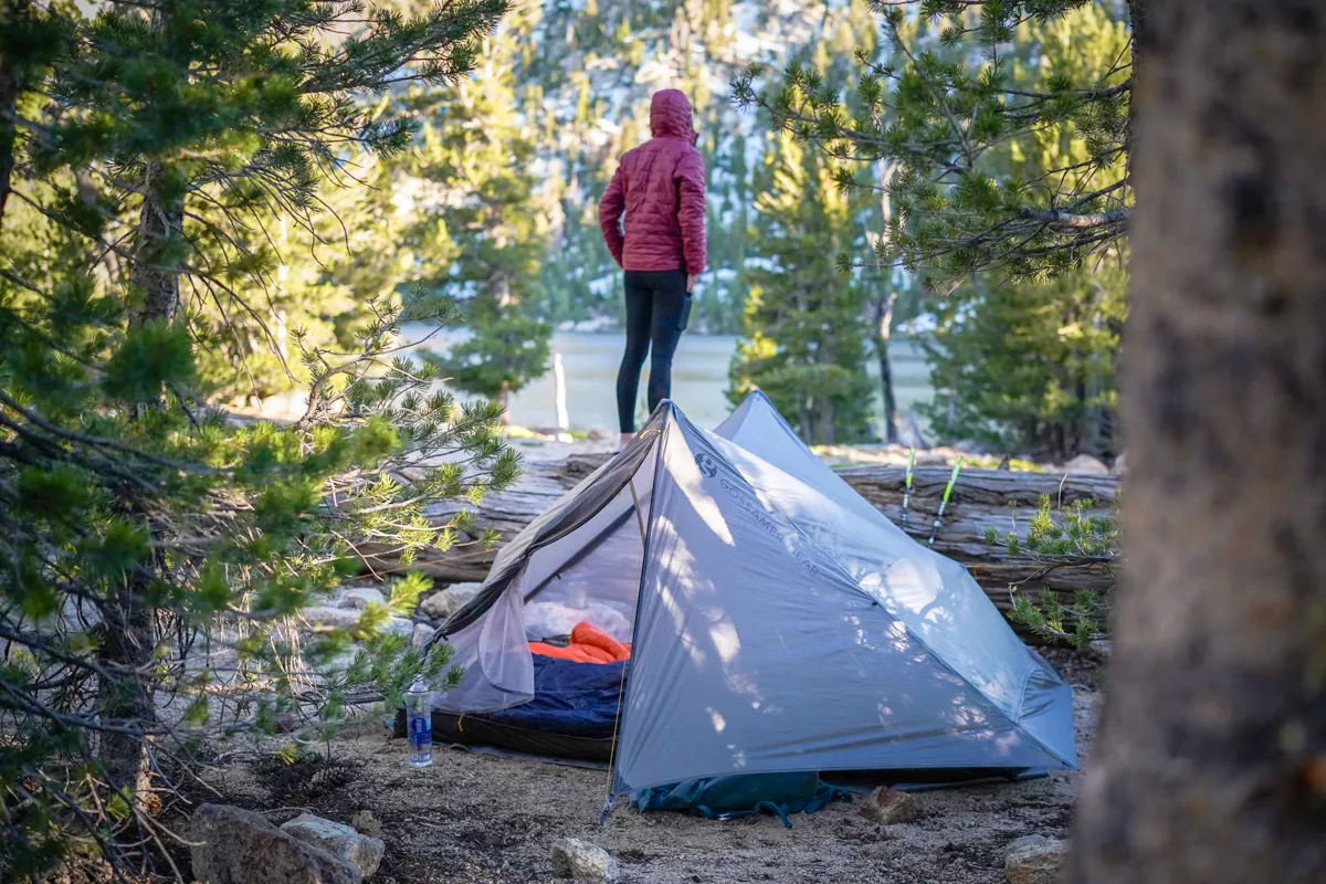 Properly pitched 2 person non freestanding tent on mountain trail