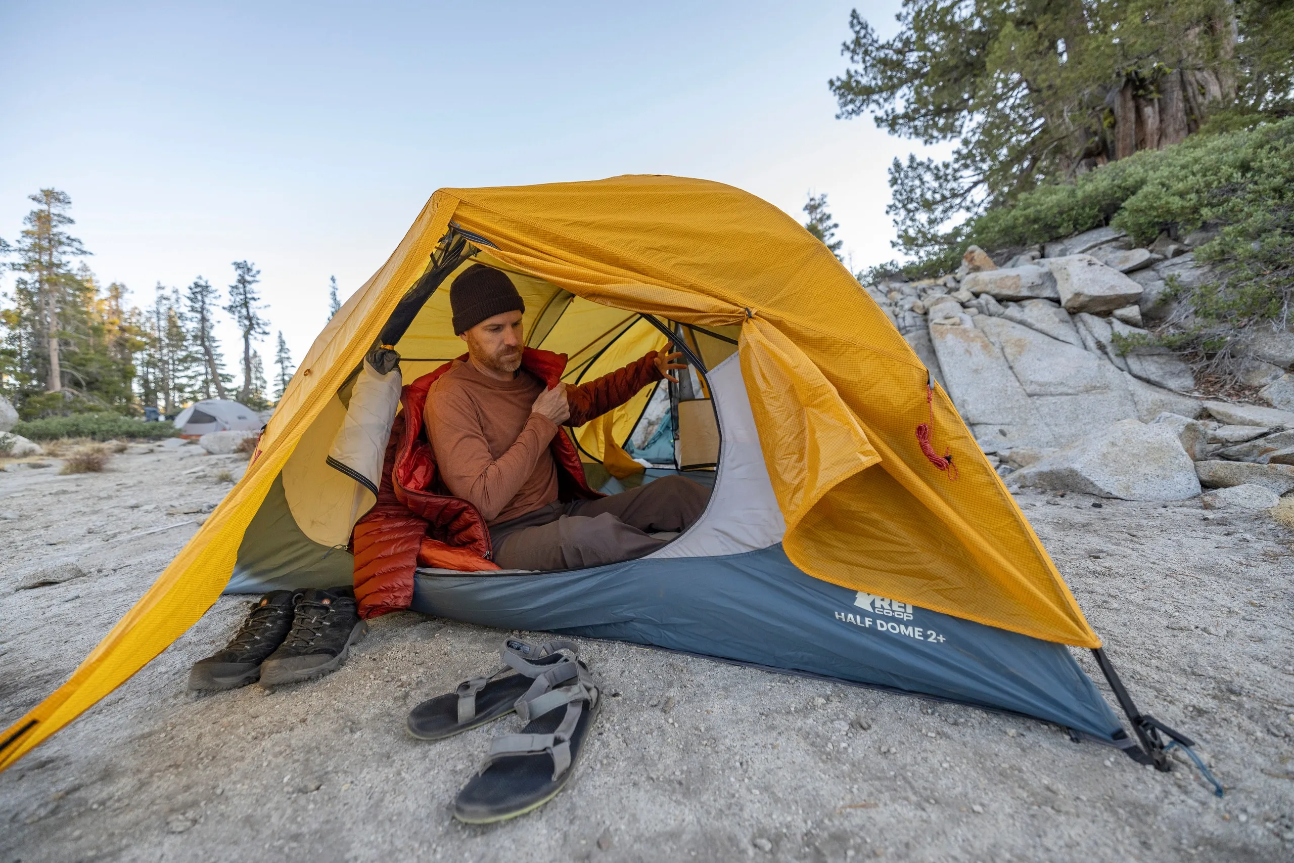Premium backpacking tent setup in wilderness with mountain view