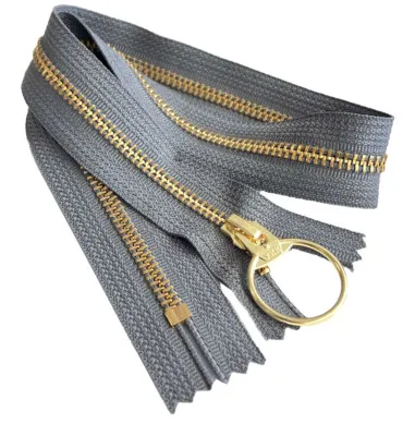 YKK brass metal zipper close-up showing quality construction