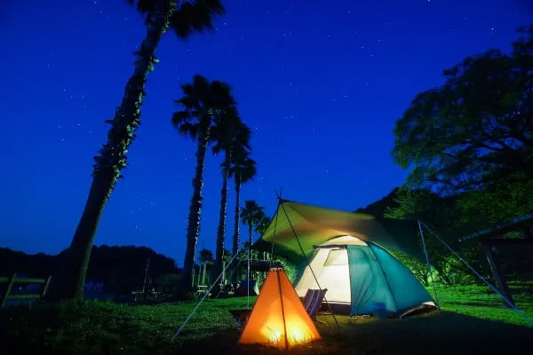 Non toxic tent setup with protective tarp showing proper chemical-free camping configuration