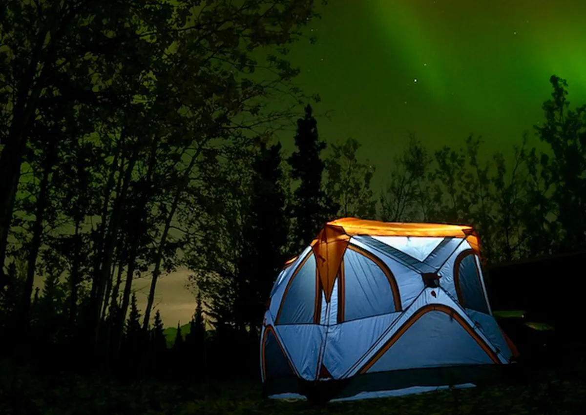 Comparison of different tall 2 person camping tents setup outdoors