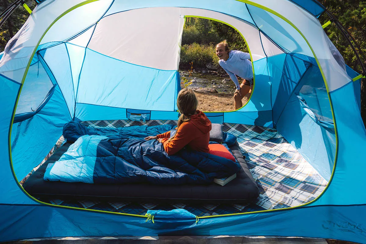 Interior view of a tall 2 person camping tent showing proper setup and spacious headroom