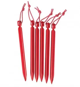 Comparison of different tent stake types showing quality differences