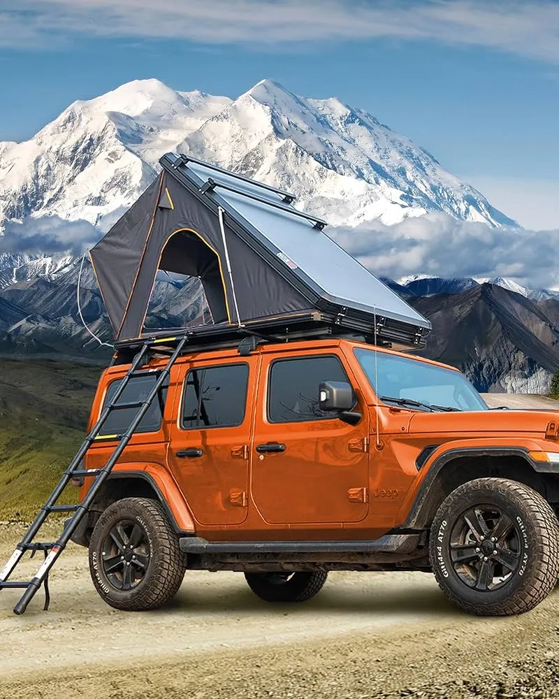 Premium hard shell roof top tent showing professional installation and outdoor camping setup