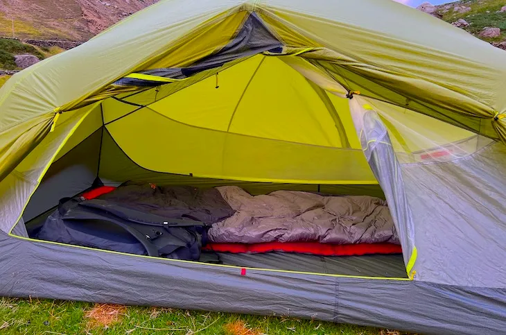 Nemo Dagger OSMO tent set up in mountainous terrain showing spacious interior design