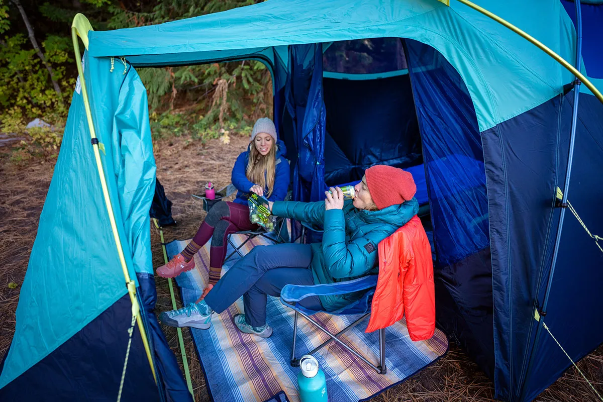 Campers enjoying North Face tent vestibule setup