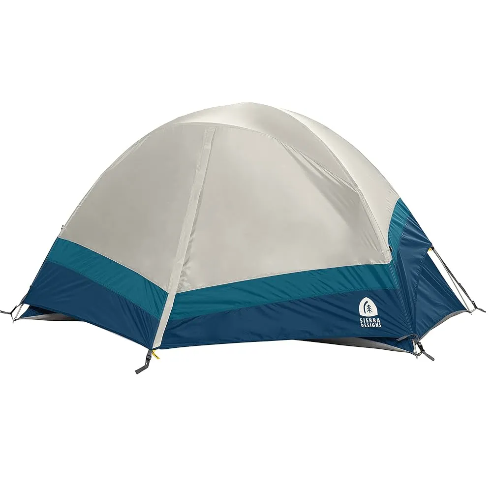 Sierra Designs Crescent 2 person dome tent displayed with camping gear and setup accessories