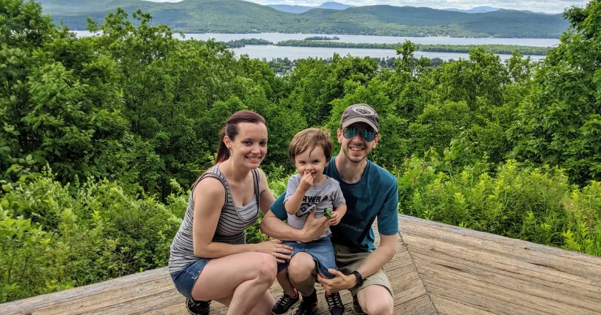 Beginner hikers enjoying scenic mountain views from an easy hiking trail overlook